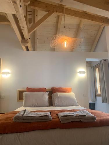 Ένα ή περισσότερα κρεβάτια σε δωμάτιο στο Maison capsule