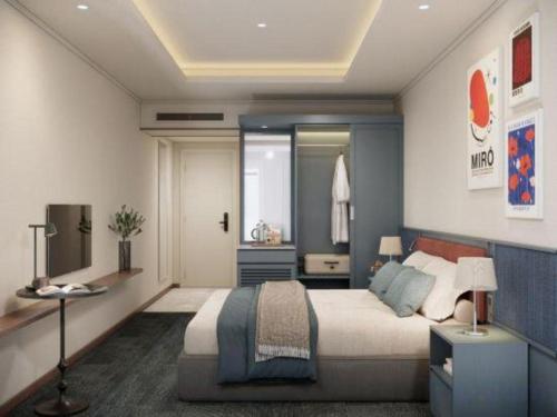 a bedroom with a large bed and a window at Lenid Hotel Tho Nhuom in Hanoi