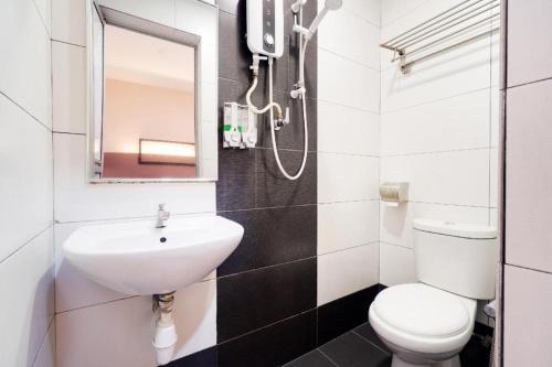 Koupelna v ubytování GM Holiday Hotel Permai Jaya