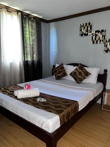 Postel nebo postele na pokoji v ubytování Sequor Palm Villa