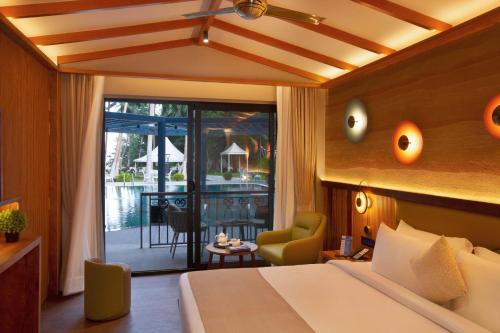 Postel nebo postele na pokoji v ubytování Coral Reef Resort & Spa, Havelock