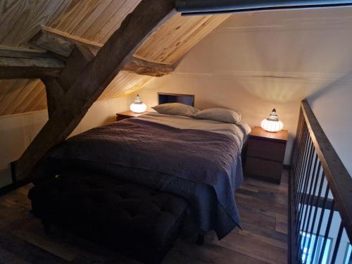 Postel nebo postele na pokoji v ubytování Gite La Maison Des Trois Grands