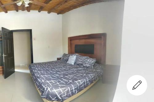Postel nebo postele na pokoji v ubytování Casa la Borgoña