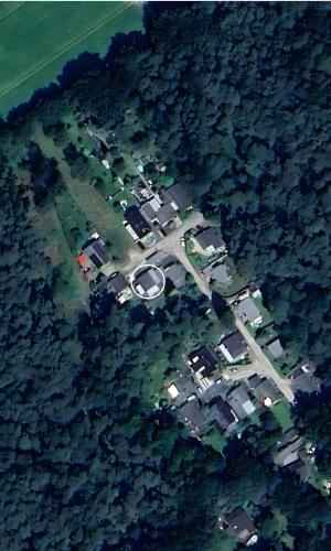 an aerial view of a parking lot with parked cars at Ferienhaus Zissi in Wegberg