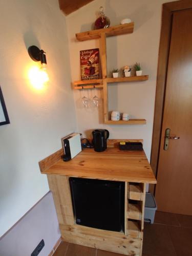 Kuchyň nebo kuchyňský kout v ubytování Camera con bagno e accesso indipendente