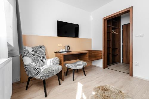 TV a/nebo společenská místnost v ubytování No 28 Rooms & Apartments