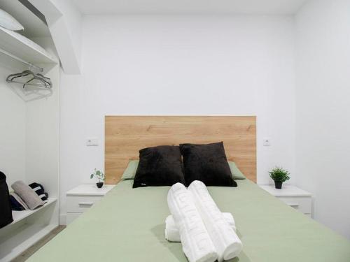 Ένα ή περισσότερα κρεβάτια σε δωμάτιο στο La maruca loft deluxe 3000