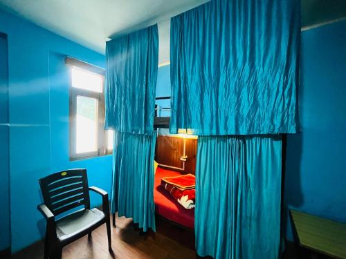 Non Stop Cafe Hostel & Stayにあるベッド