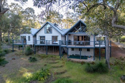 an aerial view of a house with a large deck at Daydreamer I Private Properties in Quindalup