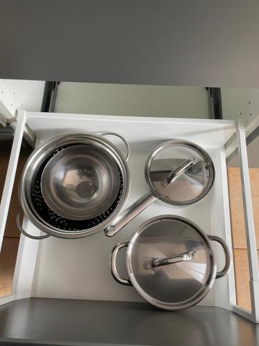 a white shelf with a washing machine on it at APARTAMENTO CANILLO Wifi-Parquing free-Terraza HUT 5213 in Canillo