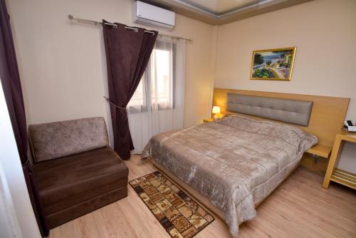 Katil atau katil-katil dalam bilik di Dimitra House