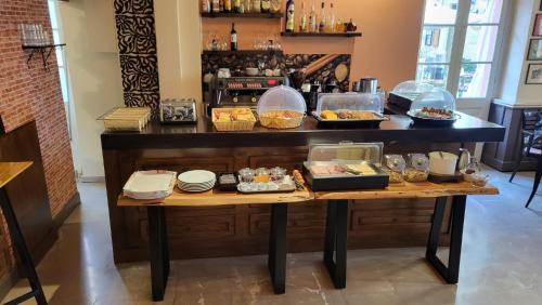 a table with various food items on top of it at Pension 2Be in Nafplio