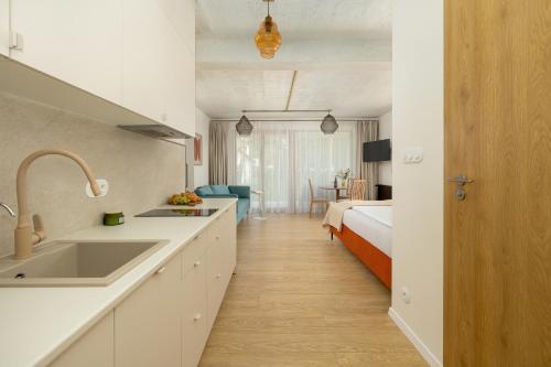 Η κουζίνα ή μικρή κουζίνα στο Apartamenty Szumimorze