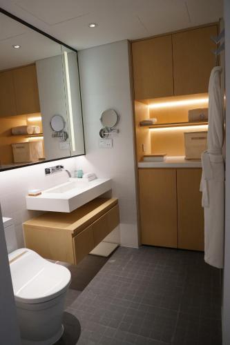 Koupelna v ubytování Zhengzhou Jianye Tianzhu International Apartment