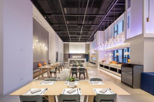 Restaurace v ubytování Zhengzhou Jianye Tianzhu International Apartment