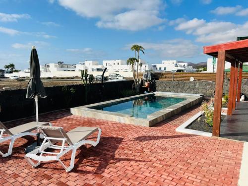 Kolam renang di atau dekat dengan Villa Pol Lanzarote