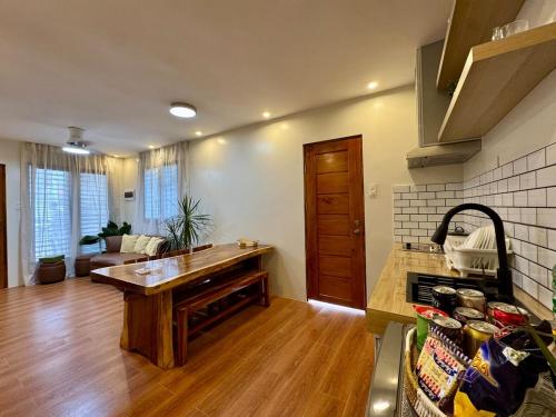 a kitchen with a wooden counter top in a room at The 19th Transient House in Solano 1 in Solano