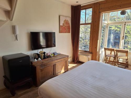 Gulta vai gultas numurā naktsmītnē A B&B Amsterdam