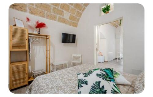 Postel nebo postele na pokoji v ubytování Suite Maison Rouge