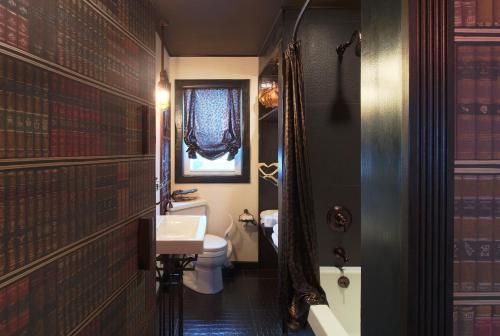 a bathroom with a sink and a toilet at The Roxbury in Roxbury