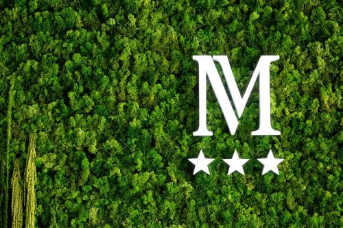 an overhead view of a forest with stars and themn at Molėtai Hotel in Molėtai