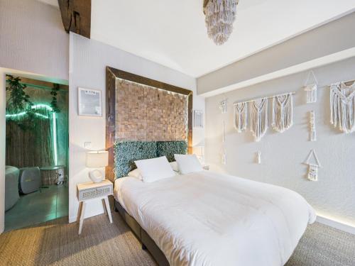 Giường trong phòng chung tại Tulum - Spa & Voyage