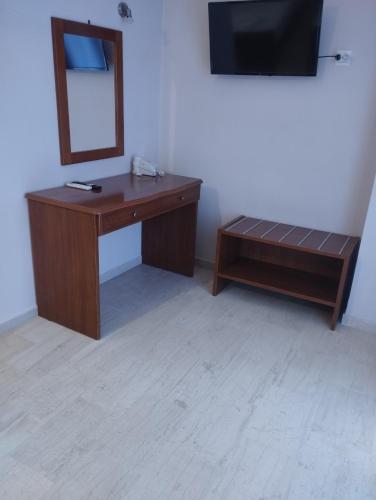 TV a/nebo společenská místnost v ubytování Panos Apartments