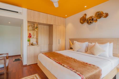 Letto o letti in una camera di Alaya Stays Gracias Retreat near Ashvem Beach 3 minutes Walk From The Beach