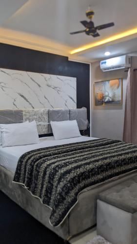 Postel nebo postele na pokoji v ubytování Nems Appartment