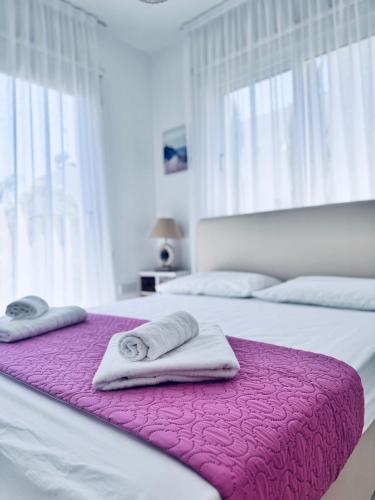 Ένα ή περισσότερα κρεβάτια σε δωμάτιο στο Nissini Wana Luxury Villa