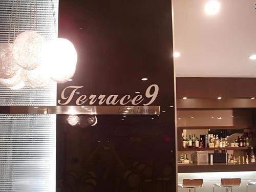 a restaurant with a sign that says fennec at Suanbo Park Hotel in Suanbo