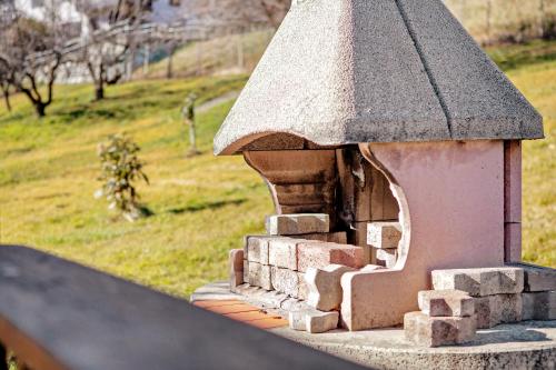 a small house with a roof on a ledge at Verger Plein Soleil di Piero in Saint-Pierre