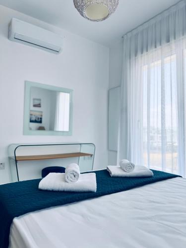 Ένα ή περισσότερα κρεβάτια σε δωμάτιο στο Nissini Wana Luxury Villa