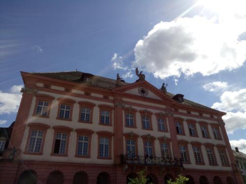 a large building with a sky in the background at Ferienwohnung Sester in Gengenbach