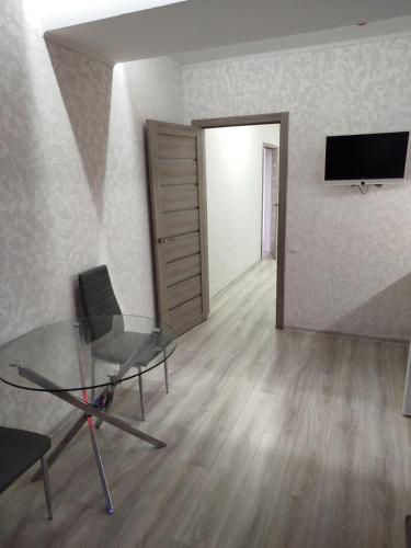 TV a/nebo společenská místnost v ubytování apart-hotel Sky