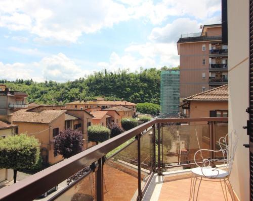 a balcony with a view of a city at Le Stanze dei Doria in Valmontone