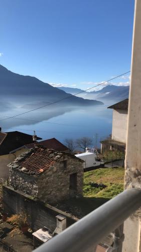 a view of a body of water with a building at Villa Wetzel Domaso in Montemezzo