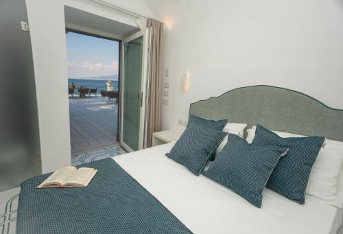 Postel nebo postele na pokoji v ubytování Mirea Relais de Charme