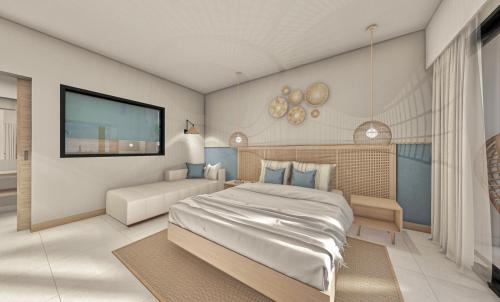 Coral Azur Beach Resort Mont Choisyにあるベッド