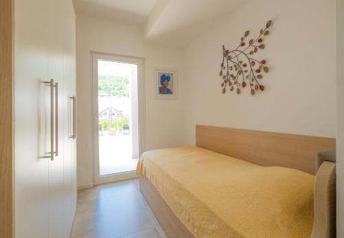 Postel nebo postele na pokoji v ubytování Opatija Villa Mia