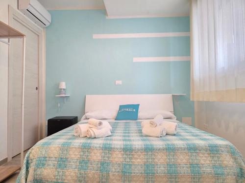 Postel nebo postele na pokoji v ubytování B&B Litoranea 80