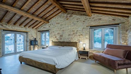 Postel nebo postele na pokoji v ubytování Anfihouse B&B and Apartments