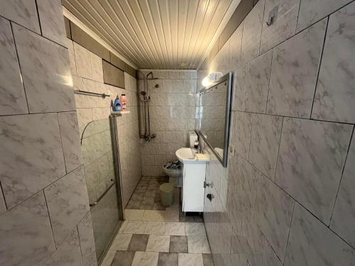a bathroom with a toilet and a sink at Olga Studios in Heraklio Town