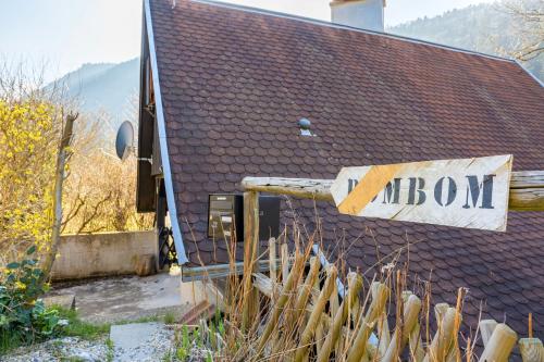 a sign on the side of a building with a brown roof at Chalet in Mittlach