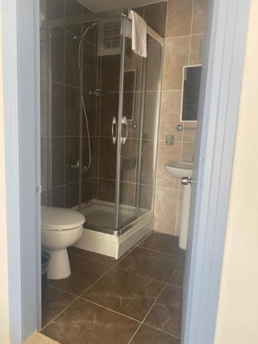 Koupelna v ubytování Pasifik Hotel