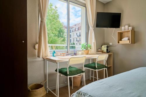 Ένα ή περισσότερα κρεβάτια σε δωμάτιο στο Charming studio, Vauban La Catho, Lille