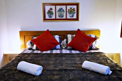 Krevet ili kreveti u jedinici u objektu Holidayhome Alam Cipanas Puncak
