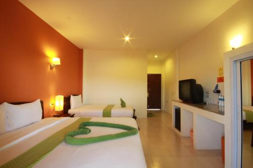 TV a/nebo společenská místnost v ubytování Tharathip Resort Koh Phangan - SHA Plus
