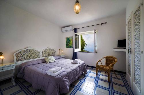 Postel nebo postele na pokoji v ubytování Agriturismo Fattoria Terranova