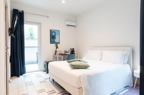 Katil atau katil-katil dalam bilik di Città Studi Suites 1 - Top Collection